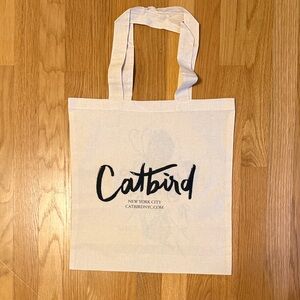 Catbird NYC Cream Canvas Tote Bag with Black Snail & Butterfly
